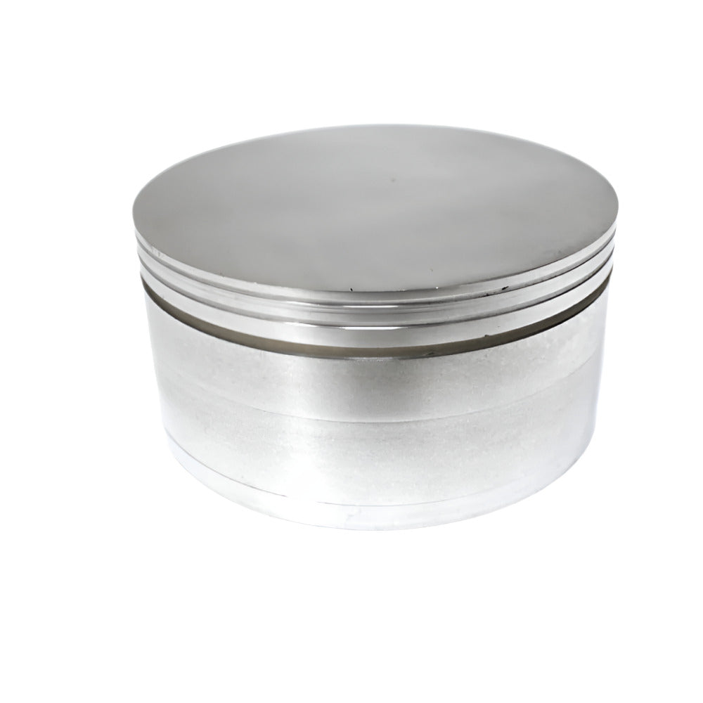 100mm 4-part heavy-duty metal grinder with extra large size, durable metal body, sharp diamond teeth, magnetic lid, and smooth herb grinding performance.