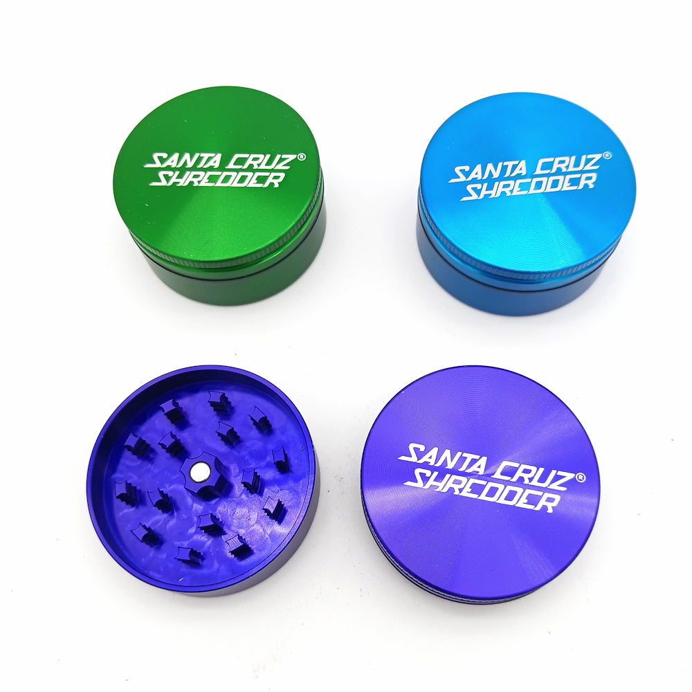 2 Part Santa Cruz Shredder style aluminium grinder medium size with sharp diamond teeth, durable metal body, and smooth grinding performance design.