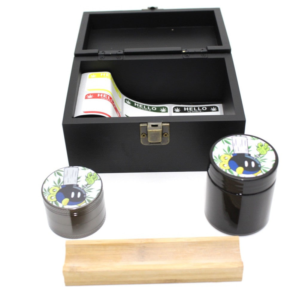 Medium bamboo herb stash box set with glass jar, decorative top decal, and 53mm 4-part zinc grinder for smooth and efficient grinding.