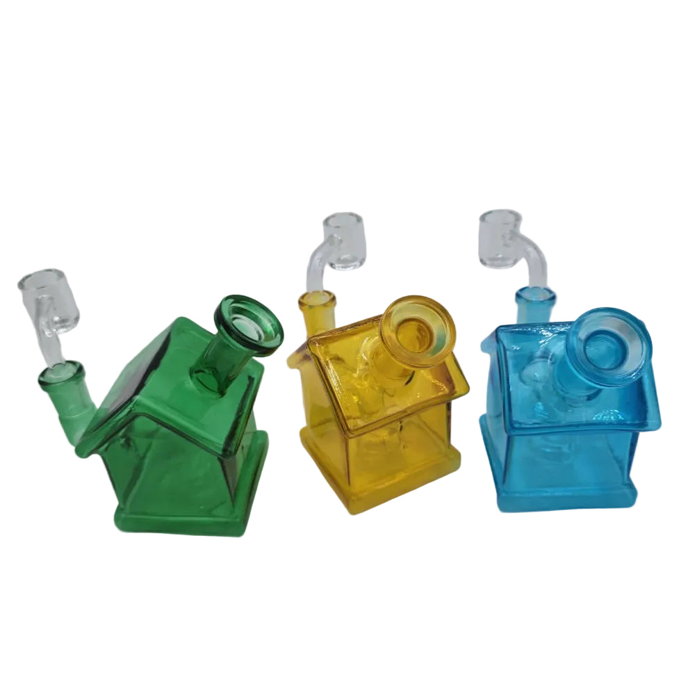 Small dab rig water pipe with 14mm male banger featuring durable glass, compact design, and smooth airflow for efficient concentrate use.