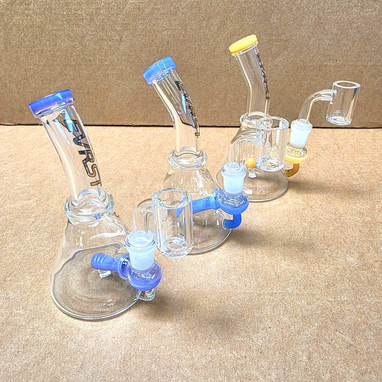 EVRST tube color dab rig water pipe with 14mm male banger, durable glass design with smooth water filtration for enhanced dabbing experience.