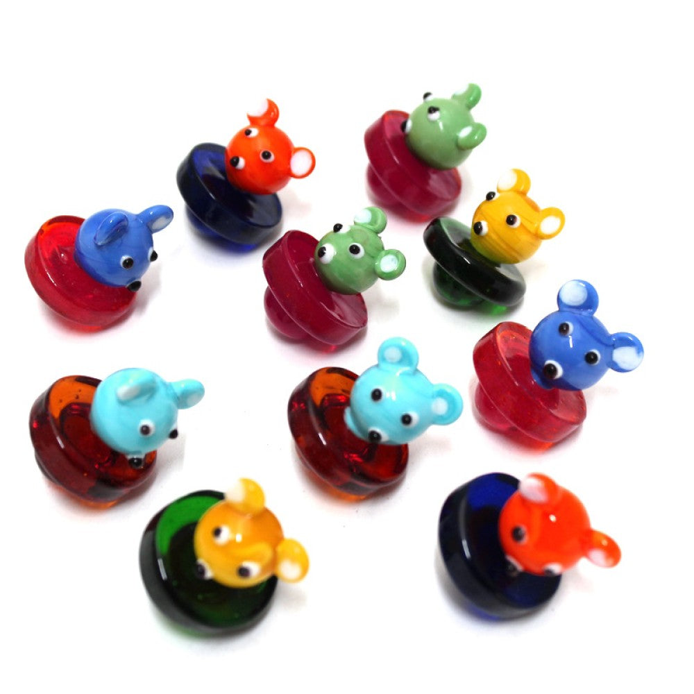 Fancy design carb cap made from heat resistant glass for smooth airflow control and quartz banger use.
