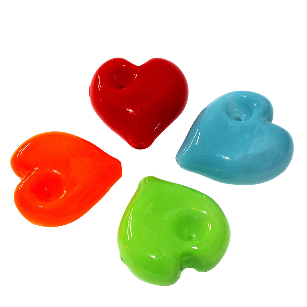 Fancy heart shape glass hand pipe, durable heat-resistant design with smooth airflow, compact and portable smoking accessory with stylish finish.