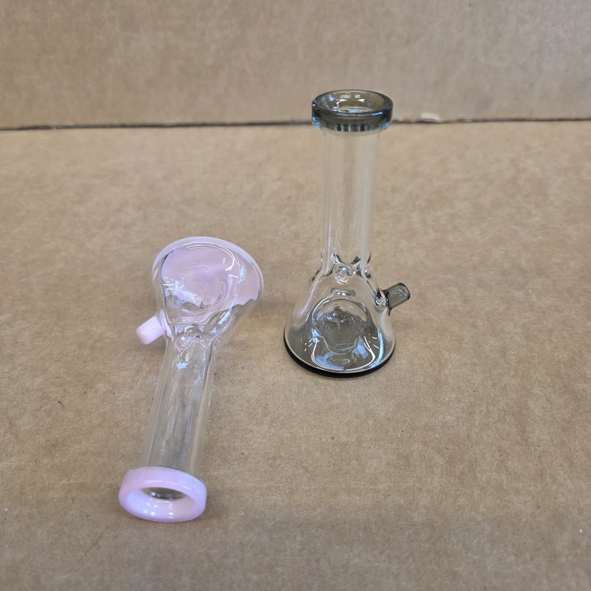 Three-quarter angled view highlighting compact size and clear borosilicate glass construction