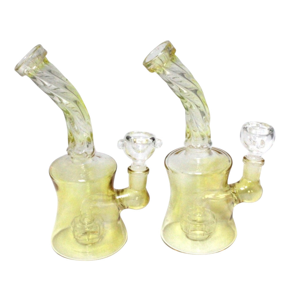 Twisted design gold fumed beaker dab rig water pipe with 14MM male banger, durable glass construction, gold fumed finish and smooth filtration system.