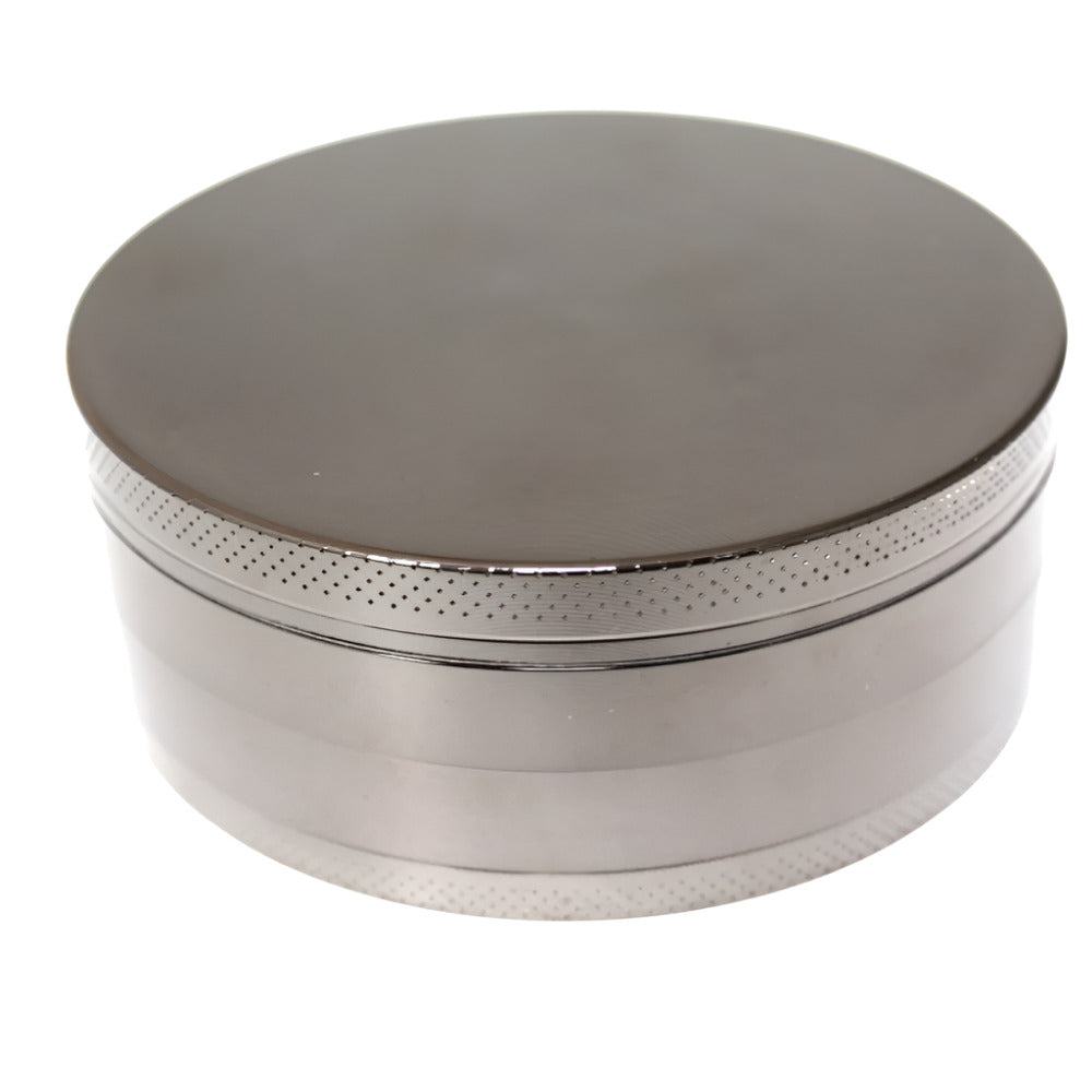 100mm 4-part heavy zinc grinder with extra large capacity, durable metal body, sharp diamond teeth, magnetic lid, and smooth herb grinding performance.