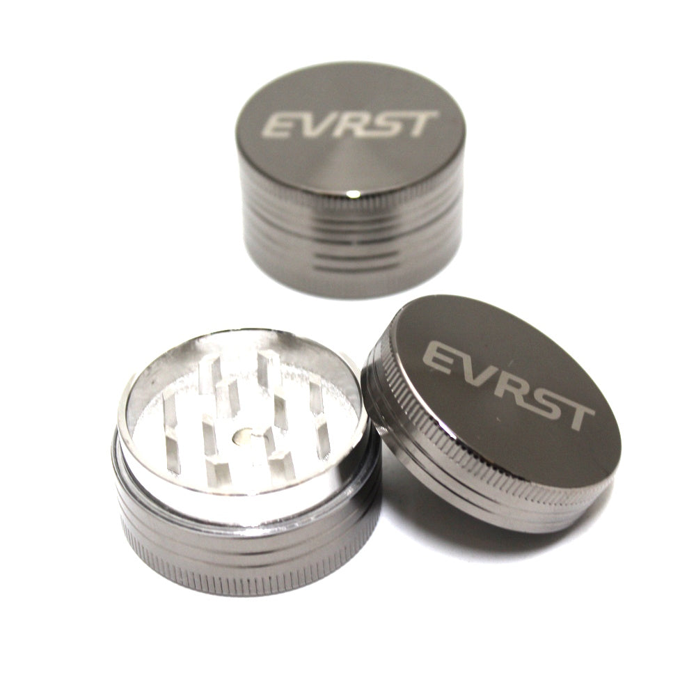 2 Part Heavy Small Size EVRST Zinc Grinder with sharp teeth, durable zinc alloy body, and magnetic lid for smooth grinding performance.