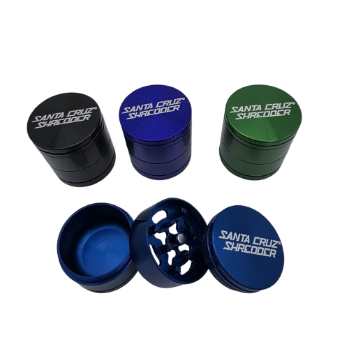 Small 3-piece Santa Cruz grinder with compact design, durable construction, and sharp teeth for smooth and efficient grinding of herbs.