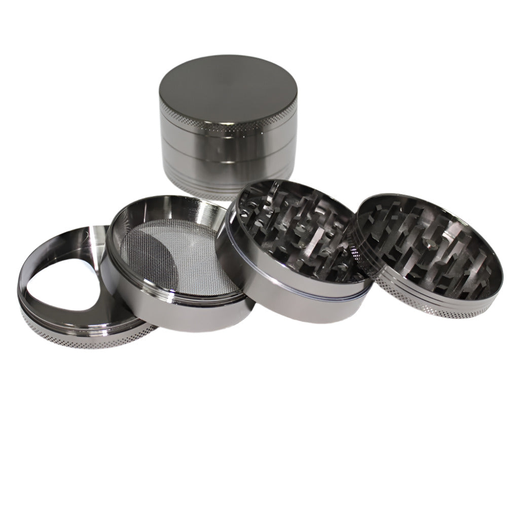 63mm 4-part zinc heavy-duty grinder with strong metal build, sharp teeth, magnetic lid, and smooth grinding performance for herbs and spices.