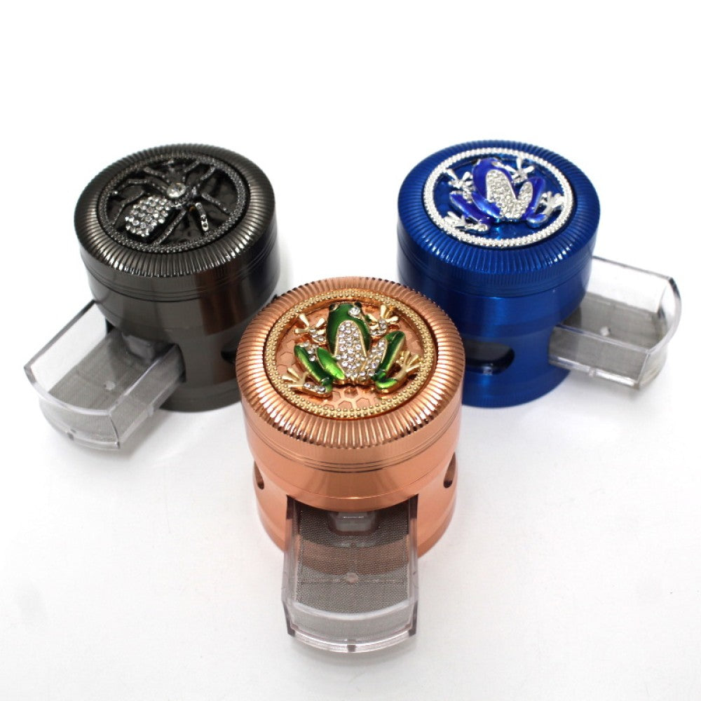 63MM heavy duty 4 layer metal grinder with assorted color top design, built-in drawer, pollen screen, and strong sharp teeth for efficient grinding.