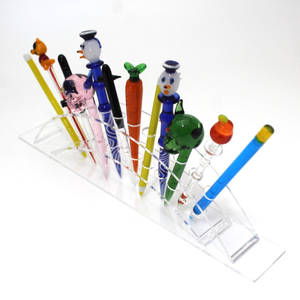 Acrylic dabber display stand holding 12 assorted style dabbers in different colors and designs for smoke shop retail display.