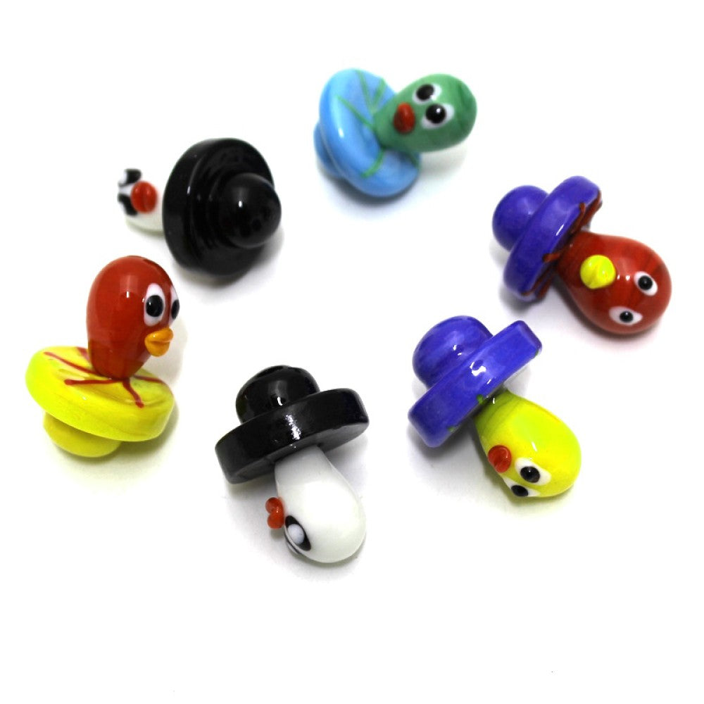 Character design glass carb cap made for airflow control and enhanced vaporization with quartz bangers