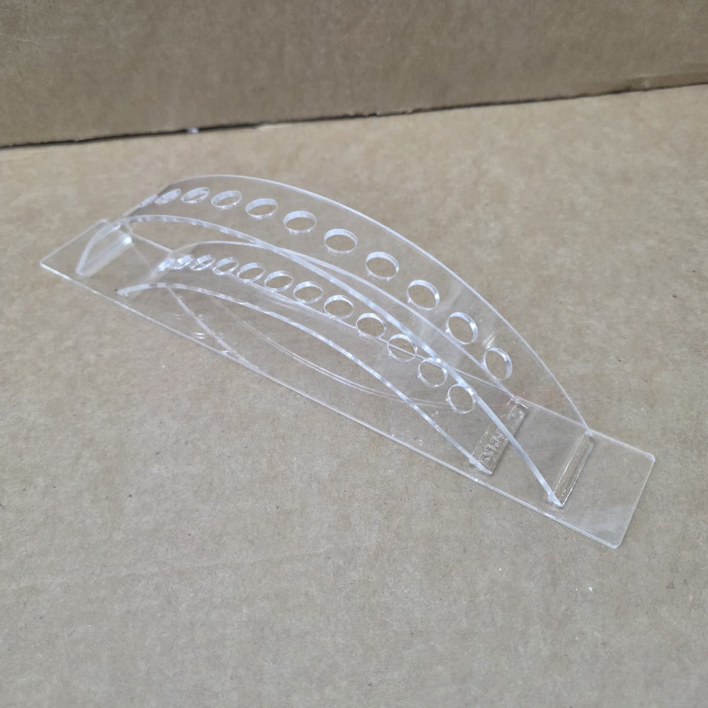 Clear acrylic dab tool display stand for organizing and presenting dabbers in smoke shops, dispensaries, and retail display cases.