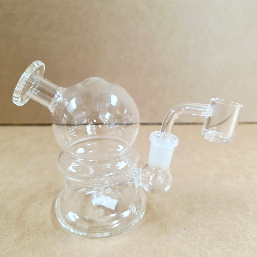 A lightweight transparent glass water pipe designed for travel and convenience.
