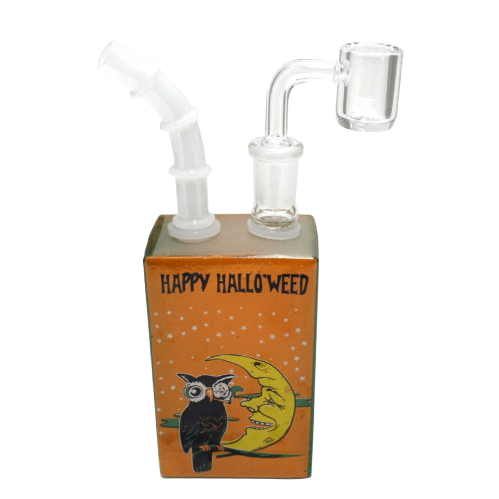 Decal Halloween design dab rig water pipe with 14MM male banger, durable glass construction, spooky themed artwork and smooth filtration system.