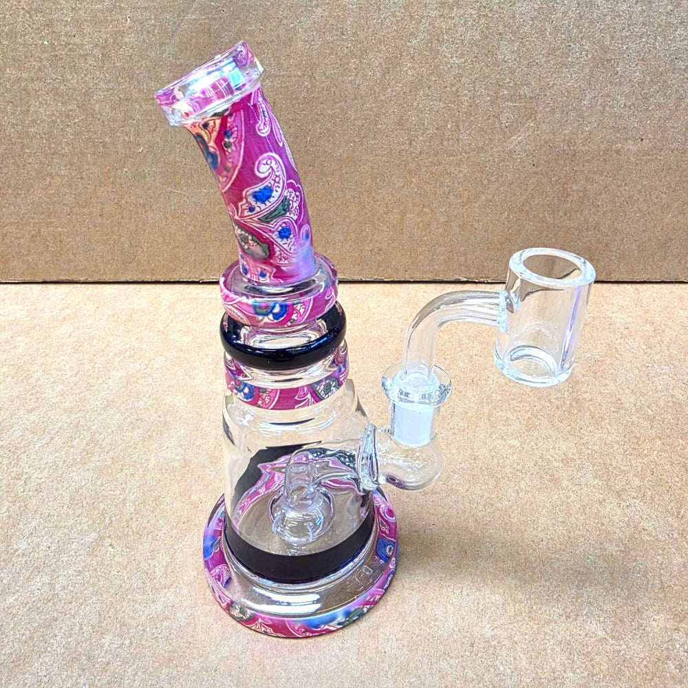 Decorative bent glass dab rig with 14mm male banger, stylish design and water filtration for a smoother experience.