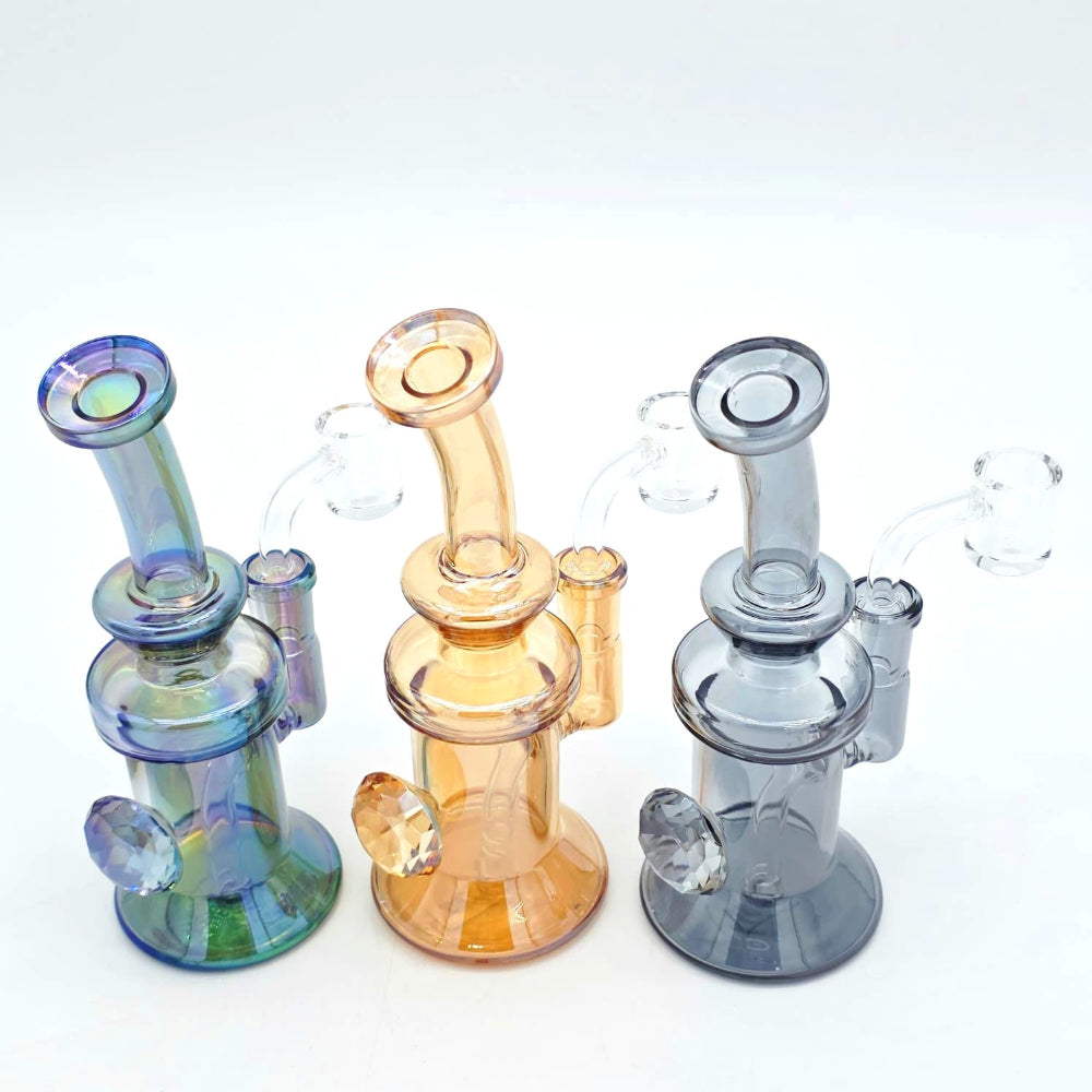 Diamond design water pipe glass bong with elegant pattern and smooth water filtration system.