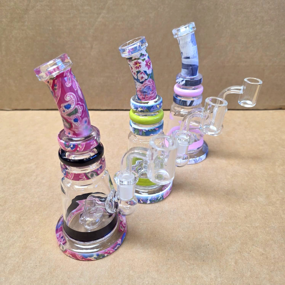 Fancy bent-style dab rig water pipe featuring a 14mm male banger and durable glass construction for smooth, enjoyable sessions.