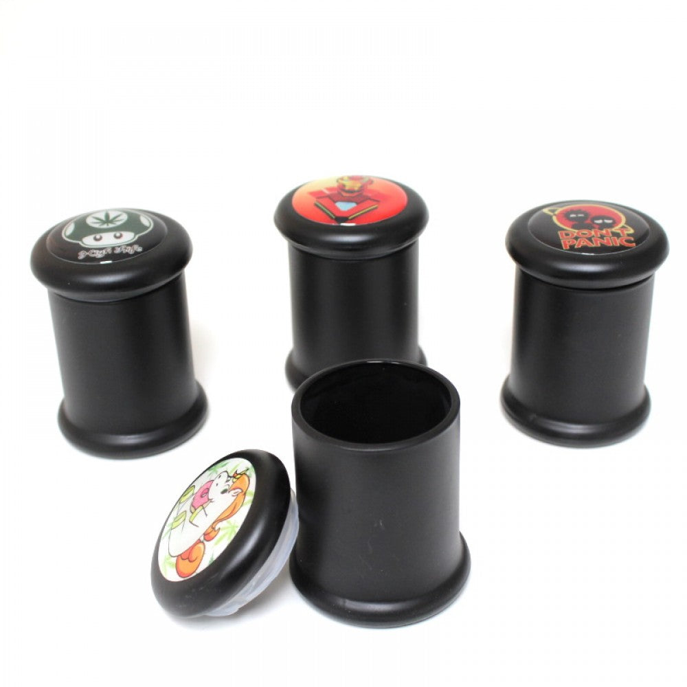 Small black glass jar with top assorted sticker design, durable glass body, secure lid, and compact stylish storage container for everyday use.