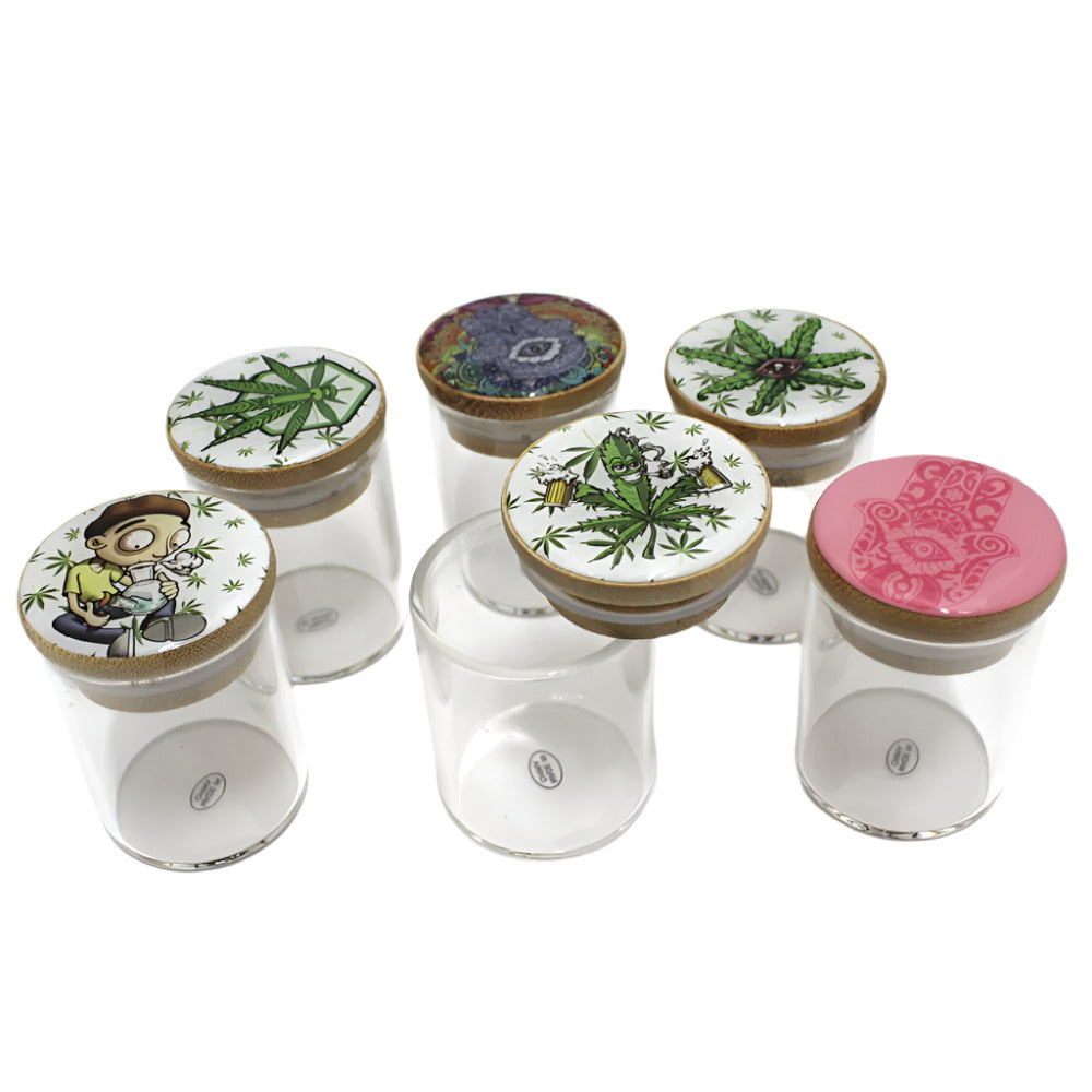 Small glass jar with bamboo lid and decal design, durable clear glass body, eco-friendly lid, and stylish compact storage container.