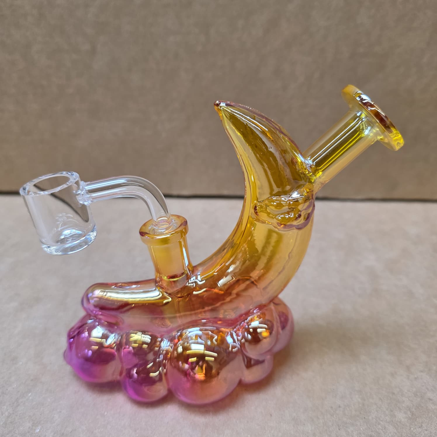 Glass dab rig with halfmoon shape design for clean vapor and smooth hits.