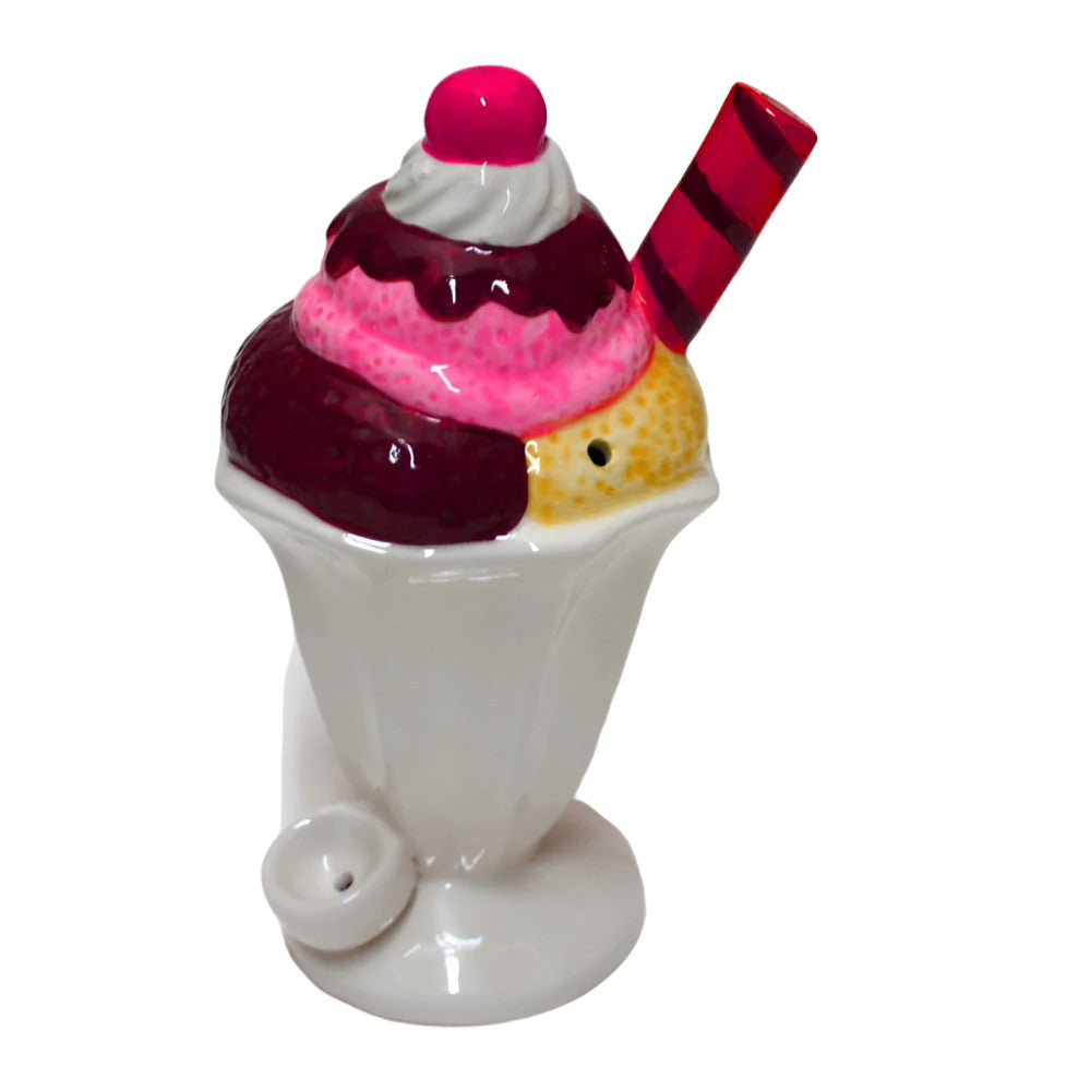 Ceramic ice cream water pipe featuring a fun ice cream-inspired design, durable ceramic construction, and smooth water filtration for an enjoyable smoking experience.