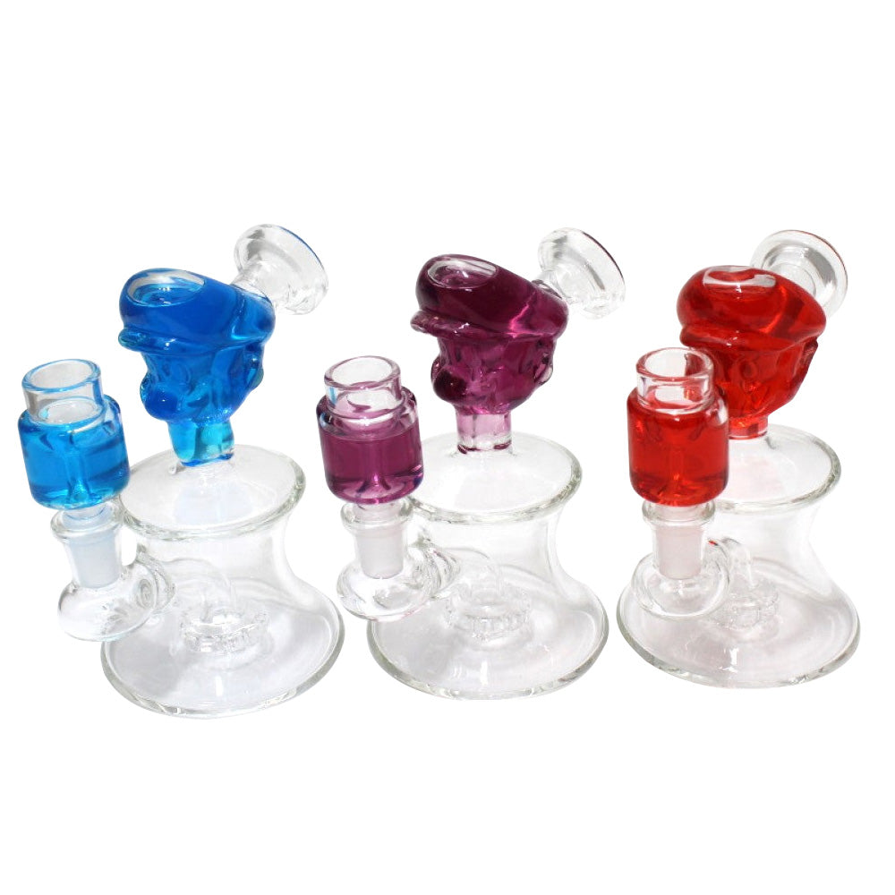 Liquid filled character design dab rig water pipe with 14mm male glass-on-glass bowl, durable glass body with smooth water filtration system.