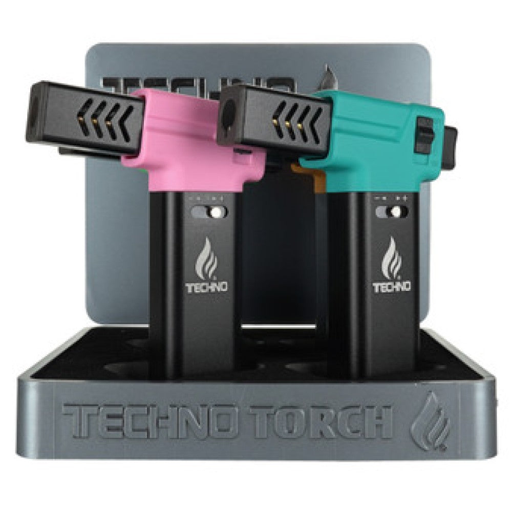 Metal slant torch lighter by Techno Torch with durable metal body, slant flame design, and refillable butane system, packed 4 pieces per display.