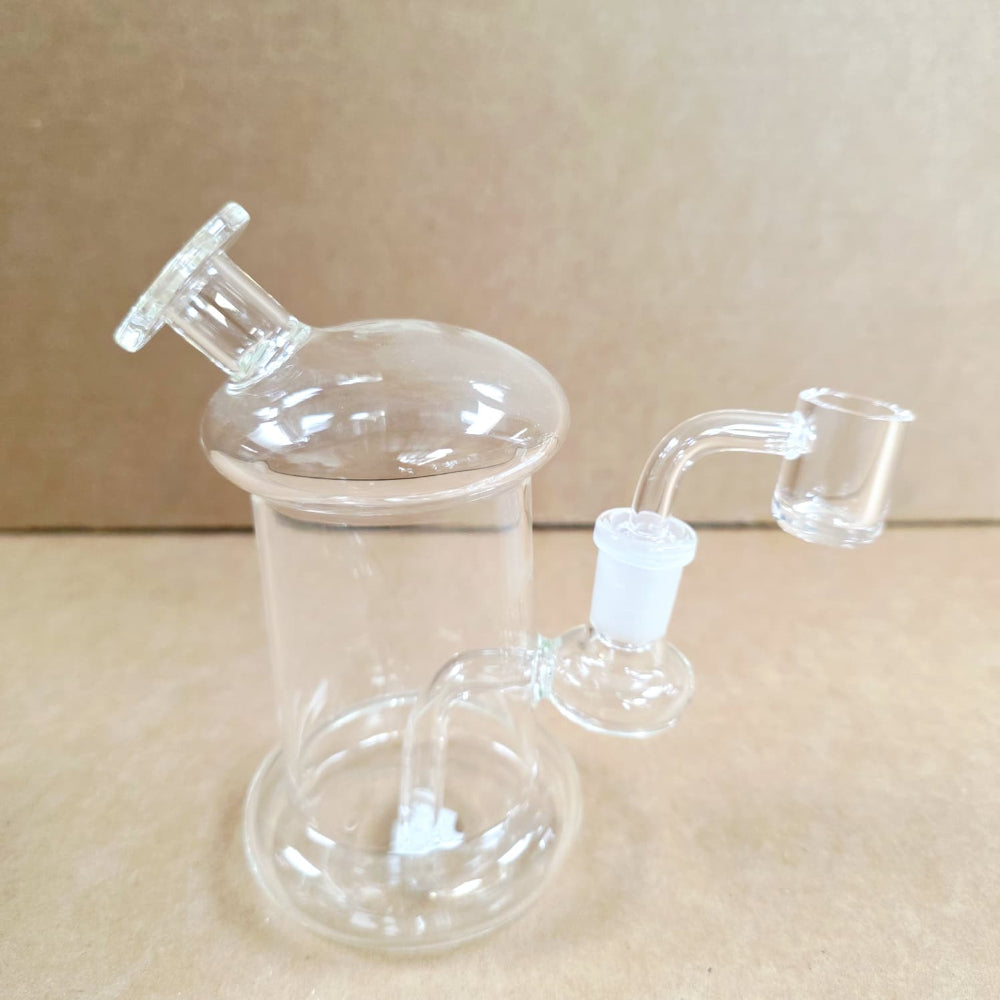 A lightweight transparent glass water pipe designed for travel and convenience.