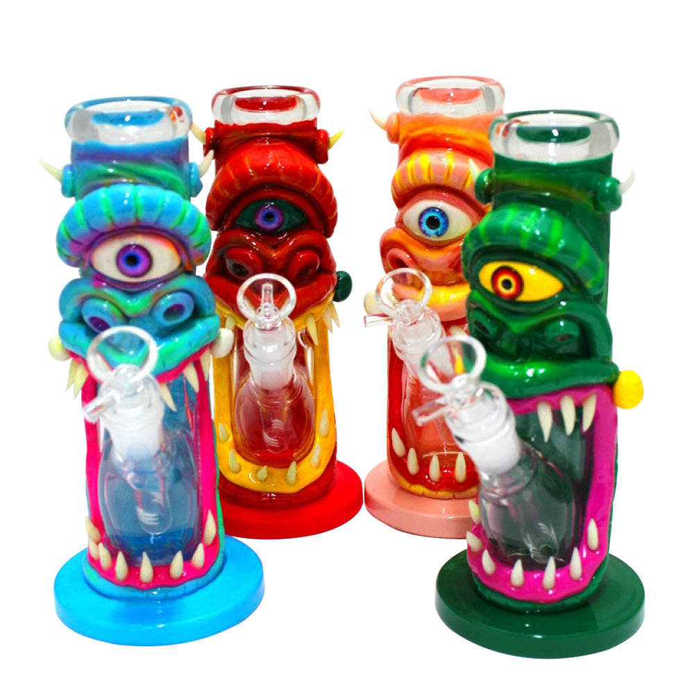 Monster design straight water pipe with small eye character artwork durable glass bong with straight tube structure smooth airflow and novelty collectible design.