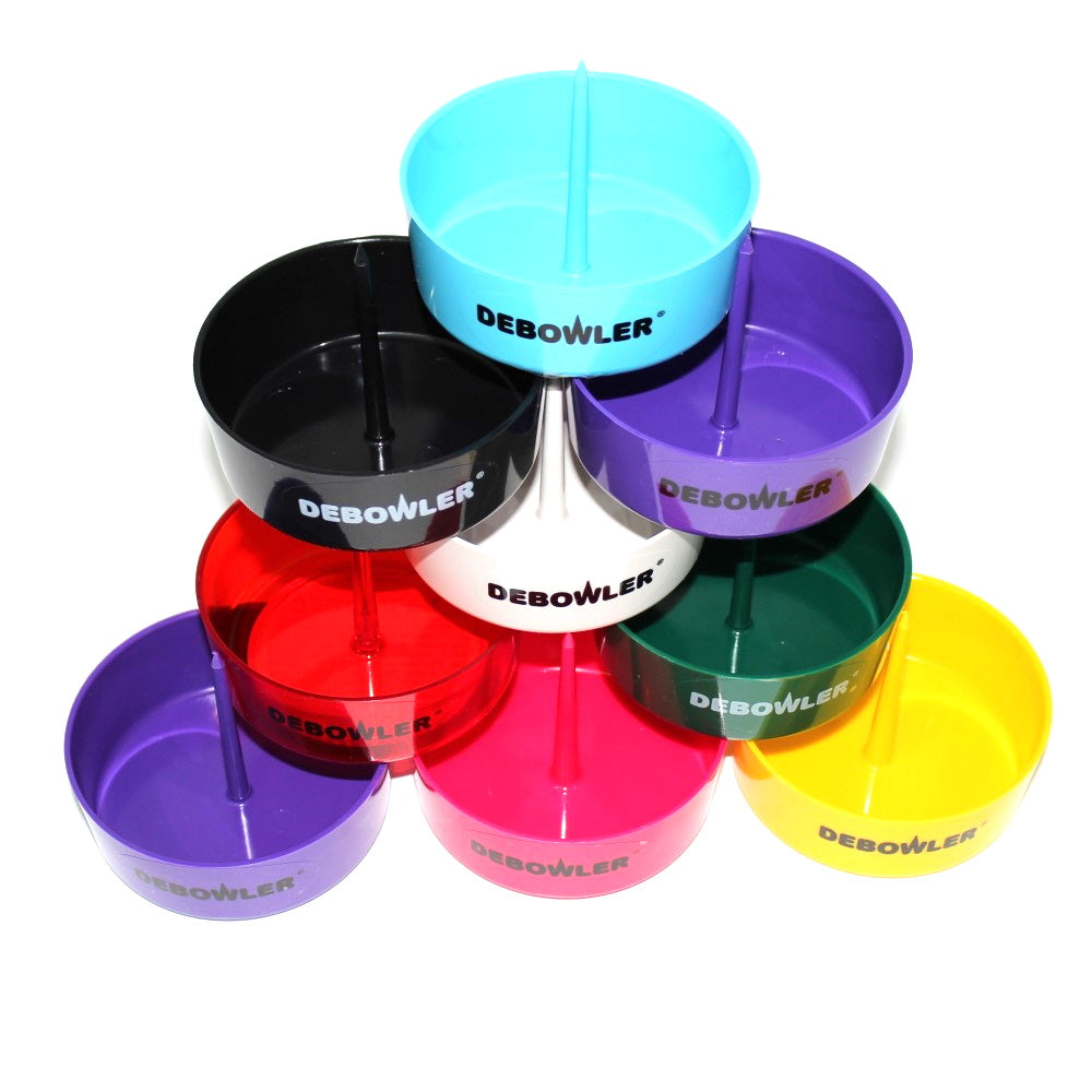 Plastic debowler ashtray with built-in cleaning spike, durable lightweight design for easy ash removal, cleaning, and everyday use.