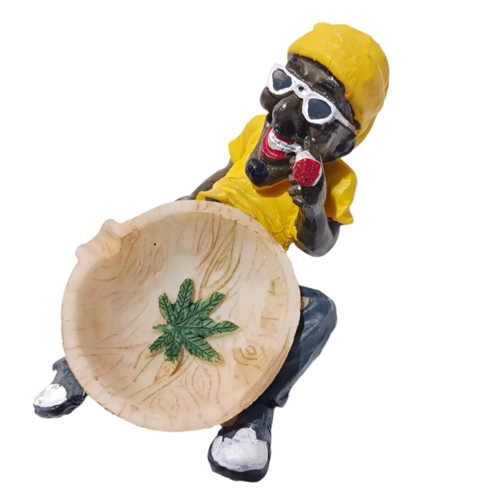Rasta color ashtray with man sitting art design, durable heat-resistant decorative ashtray with vibrant red yellow green finish and stable structure.