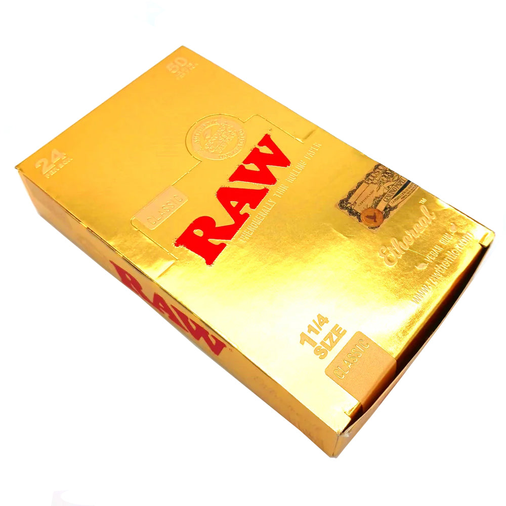 RAW Ethereal Gold 1 1/4 size rolling papers, 24 count per pack, made from ultra-thin premium paper for a slow even burn and smooth smoking experience.