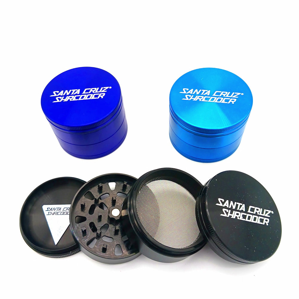 Large 4-part Santa Cruz Shredder style aluminium grinder with durable construction, sharp precision teeth, and smooth grinding performance for herbs.