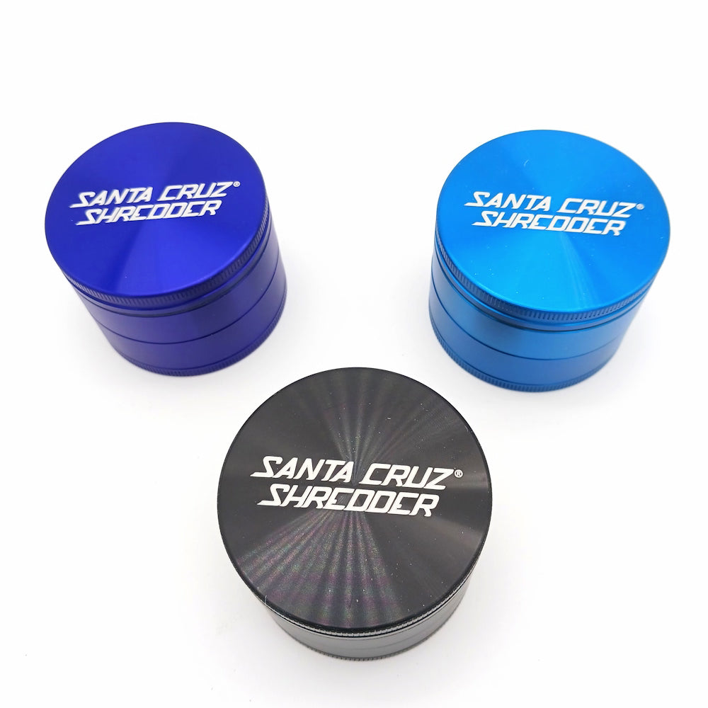 Large 4-part Santa Cruz Shredder style aluminium grinder with durable anodized body, sharp teeth, magnetic lid, and smooth herb grinding performance.