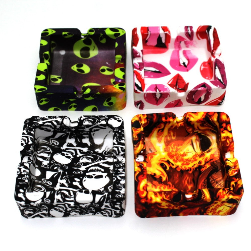 Silicone print color square ashtray with durable heat-resistant material, flexible design, and deep grooves for easy and secure ash disposal.