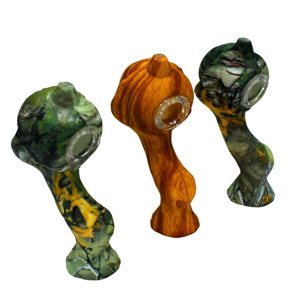 Silicone print color pumpkin hand pipe with glass bowl, durable heat-resistant silicone body featuring a pumpkin design and removable glass bowl for smooth smoking.