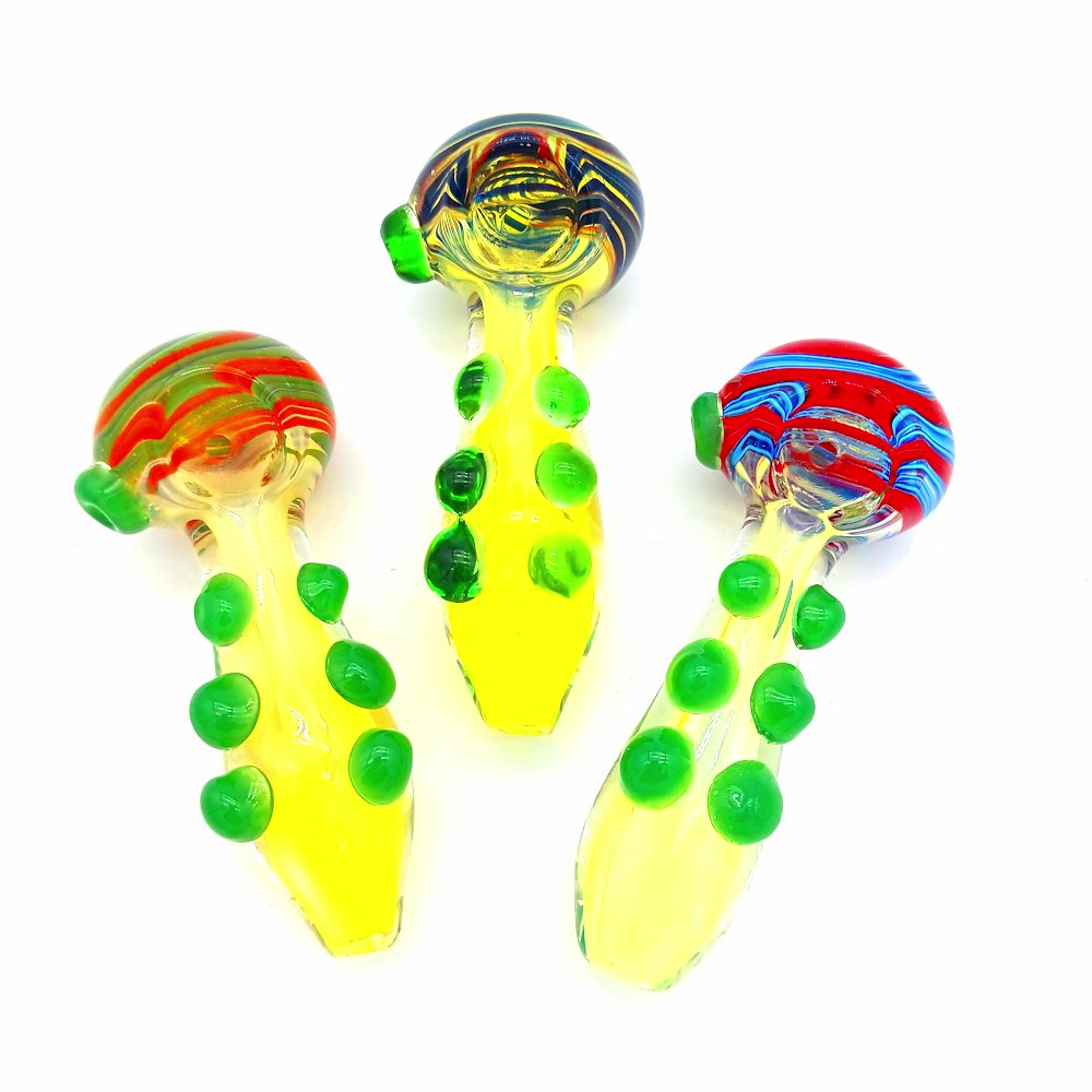 Swirl head dotted color heavy glass hand pipe featuring vibrant swirl and dotted artwork, thick durable glass construction, and compact ergonomic handheld design.