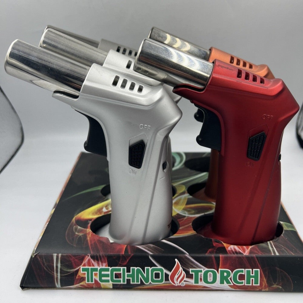 Techno Angel Slant Torch Lighter with angled flame design, ergonomic grip, and refillable butane system, packed 6 pieces per display.