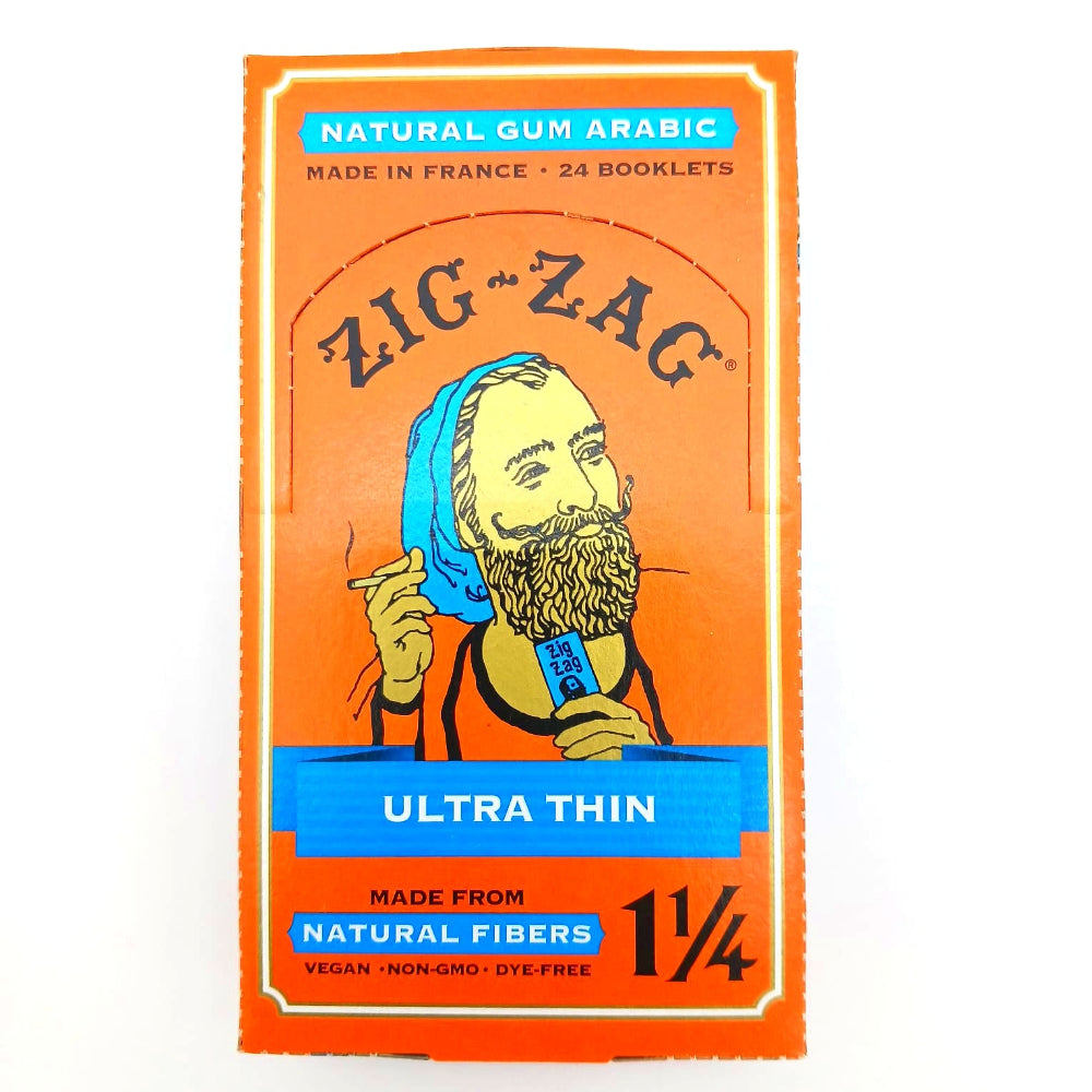 Zig Zag ultra thin natural fiber 1¼ size rolling papers, 24 booklets per pack, designed for smooth rolling, clean taste, and slow even burn.